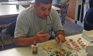 Fire Glass Studio Open House Guest Tries His Hand At Glass Fusion